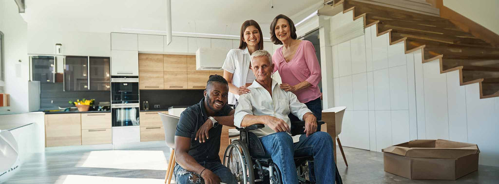Support for elderly man in a wheelchair. 